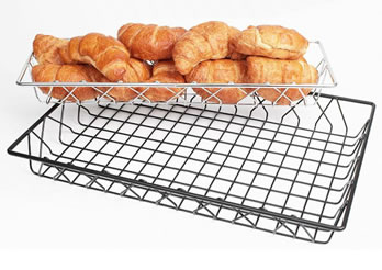 Some bread is put into a free standing wire display basket.