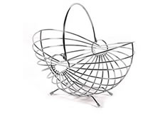 A stainless steel fruit basket with a folding handle for easy carrying